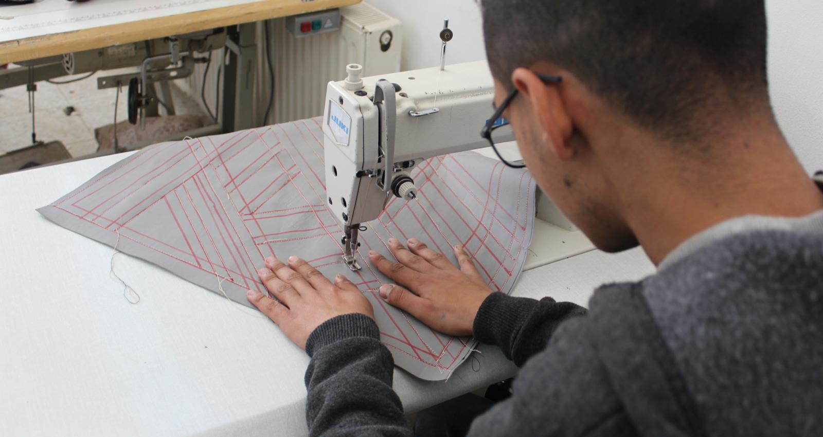 A trainee with disability receives vocational training (1)