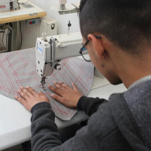 A trainee with disability receives vocational training 
